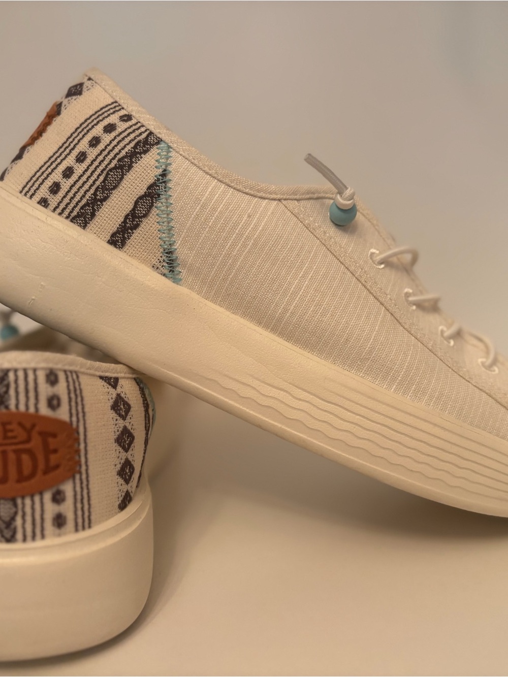 Hey Dude Women's Cream Canvas Sneakers with Turquoise Accent
